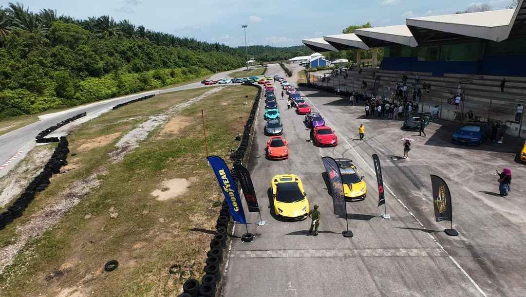 Supercars lined up on the track at a D'Concept Supercar Club event
