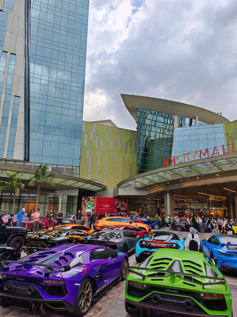 Lamborghini Aventador supercars at a gathering outside IOI City Mall